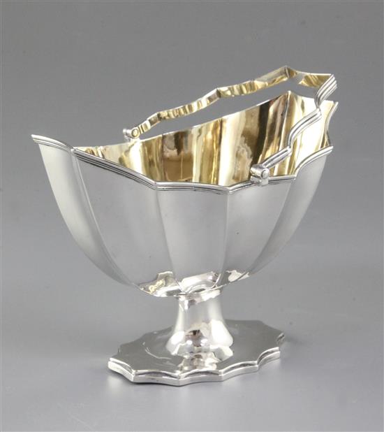 A George III silver oval bats wing sugar basket, by William Stroud, width 142mm, weight 6.9oz/215grms.